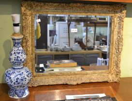 Delft pottery vase (lamp base) and a wall mirror