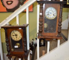 Two small sized Viennese design wall clocks