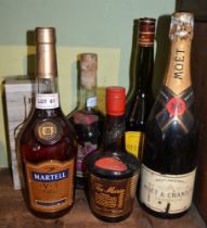 Martell VS Fine Cognac, 1 bottle Moet & Chandon Champagne, 1 bottle Jura 10 year old Single Malt Whi