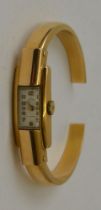 A Sultana Antimagnetic 17 rubis ladies 18ct gold bangle watch, gross weight: 14.6g