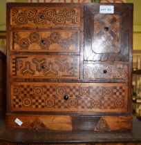 A Japanese inlaid multi-wood table top cabinet