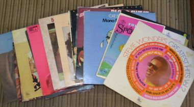 17 late 60's early 70's 12" LP records to include Moody Blues, Elton John, etc.