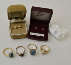Four costume rings, includes one marked 9ct and one marked 14k together with two pairs of gold earr