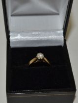 A solitaire diamond ring, set on 9ct gold band, size K1/2