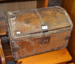 A Nineteenth Century part hide cupboard domed topped trunk with decorative metalwork