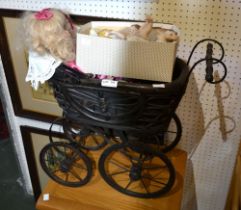 Dolls pram with a doll and a selection of porcelain 'piano babies'