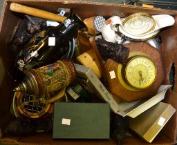 A box containing a selection of useful and collectible domestic items