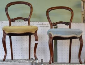 A pair of late Victorian balloon back single chairs with differently upholstered seats