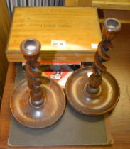 A cased manicure set, the lid inscribed "J. Ernest Fowkes", monopoly set, and a pair of oak candlest