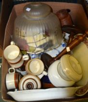 A box containing a selection of useful and collectible china wares and other items