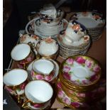 A gilt six piece tea set by Royal Albert and a quantity of Amari china