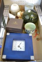 A box containing a collection of domestic items to include, candles, clock, ornaments, etc