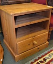 A modern pine AV storage unit with single drawer