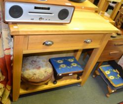 A modern oak single drawer console table