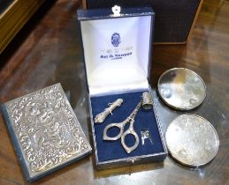 A pair of coasters, silver sewing set & Bible