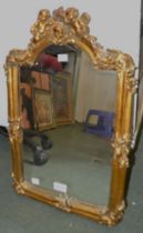 A gilded wall mirror