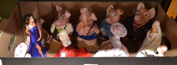 The Nat West pig family and a selection of porcelain ladies