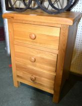 A modern oak three drawer small chest