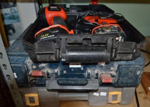 Three boxed power tools drills etc sold as seen