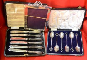 A silver photograph frame, spoons, etc