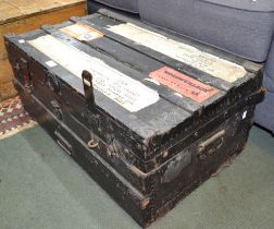 An early 20th century metal bound traveling trunk