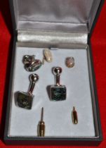 Two gold stick pins 3.44gms with protectors and three Mexican silver dress items