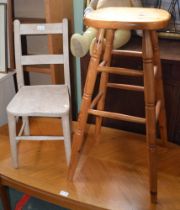 A tall modern pine stool together with a stripped child's chair