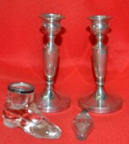 A pair of silver candlesticks, etc
