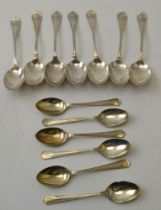 Harrison Fisher and Co, a set of six coffee spoons, Sheffield 1946, together with a set of seven ste