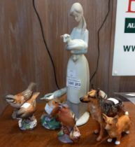 A Lladro lady, two dogs and a collection of birds