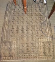 An Eastern prayer rug, shades of grey geometric on a pale ground, 127cm x 94cm