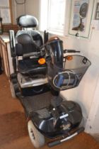 A Scooter Mart Lagonda mobility scooter currently in working order but in need of TLC