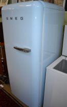 Pale blue retro design Smeg refrigerator with ice making compartment
