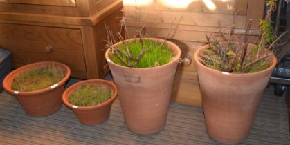 Four garden terracotta pots
