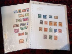 Collections of Guatemala and Nicaragua stamps on album pages