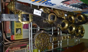 A selection of vintage horse brasses on leather straps