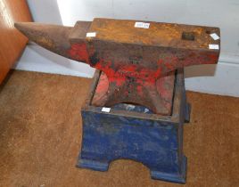 A anvil on metal stand, the anvil, 57cm long, overall 54cm high (incl. stand)