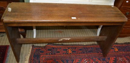 An oak organ stool