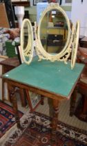 A vintage folding green baize top card table with a triple cream painted dressing table mirror