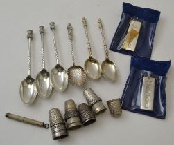 Josiah Williams and Co, three silver spoons with cast thistle terminals, London 1908/9, together wit