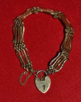 9ct gold gate link bracelet with heart shaped lock 7gms