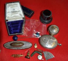 A silver pill box, locket, etc.