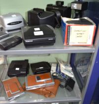 A wide selection of Polaroid cameras, to include 4 x SX-70 and other similar plus accessories