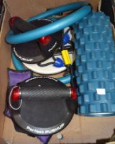 A box containing various keep-fit items