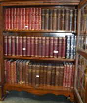 Three shelves of decorative vintage books