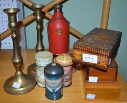 Three small wooden boxes a pair of brass candlesticks and other metalware