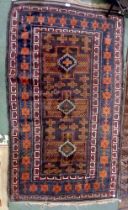 A modern woven woollen blue ground Afgan "Herat" tribal rug 104 x 170 cm