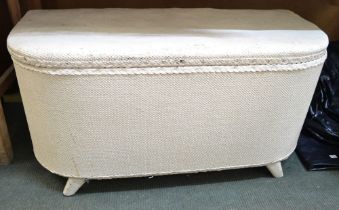 A white painted Lloyd Loom style ottoman