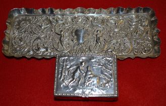 An embossed silver box and tray