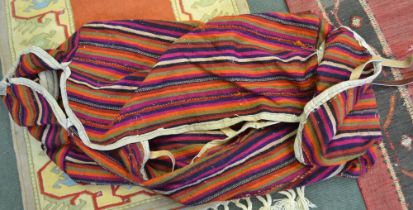 A striped nomadic Mafrash bedding bag